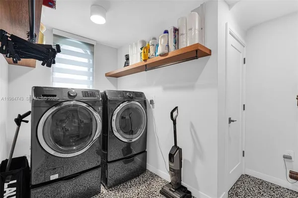 an aerial view of residential building with outdoor space