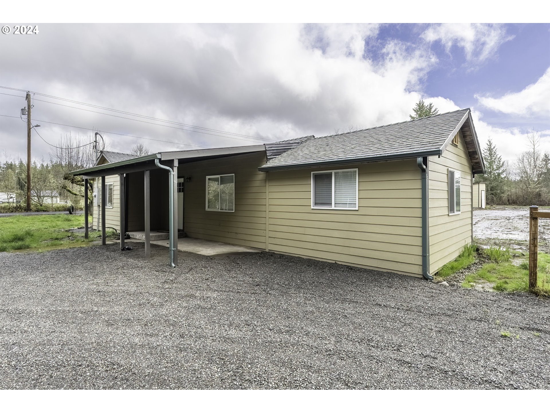 128 Eadon Road Toledo, WA 98591 - Photo 3 of 35 a backyard of a house with lots of green space