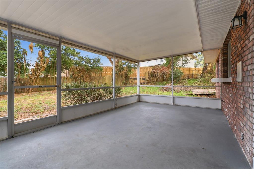 148 Lake Otis Road Winter Haven, FL 33884 - Photo 38 of 44 a view of room with floor to ceiling window and an outdoor view