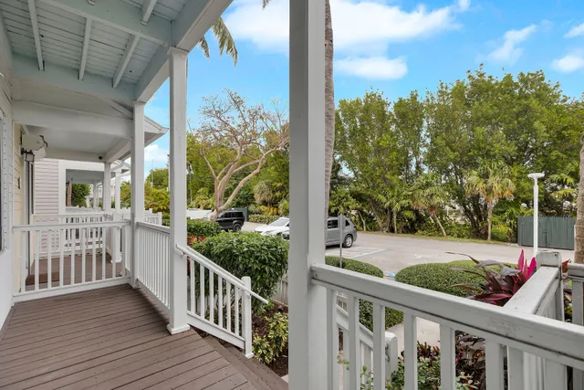 a big yard with large trees and a big yard