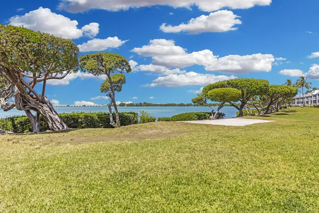 a view of a porch with two chairs and a table