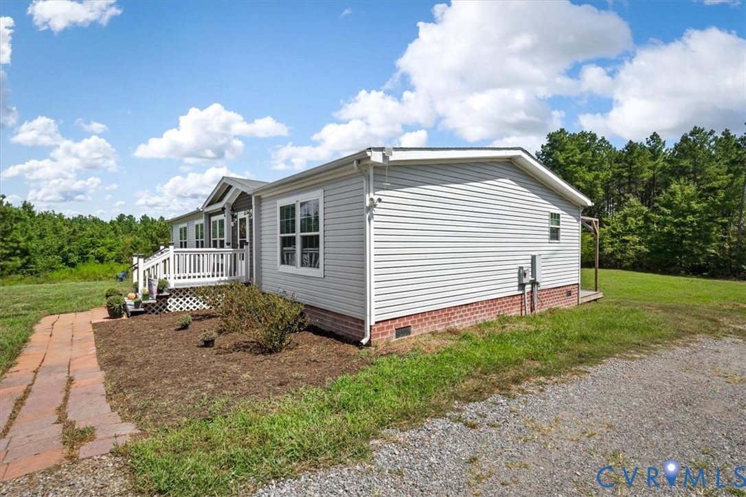 2181 Mill Quarter Road Ford, VA 23850 - Photo 47 of 56 Light-colored siding exterior with a white trim, b