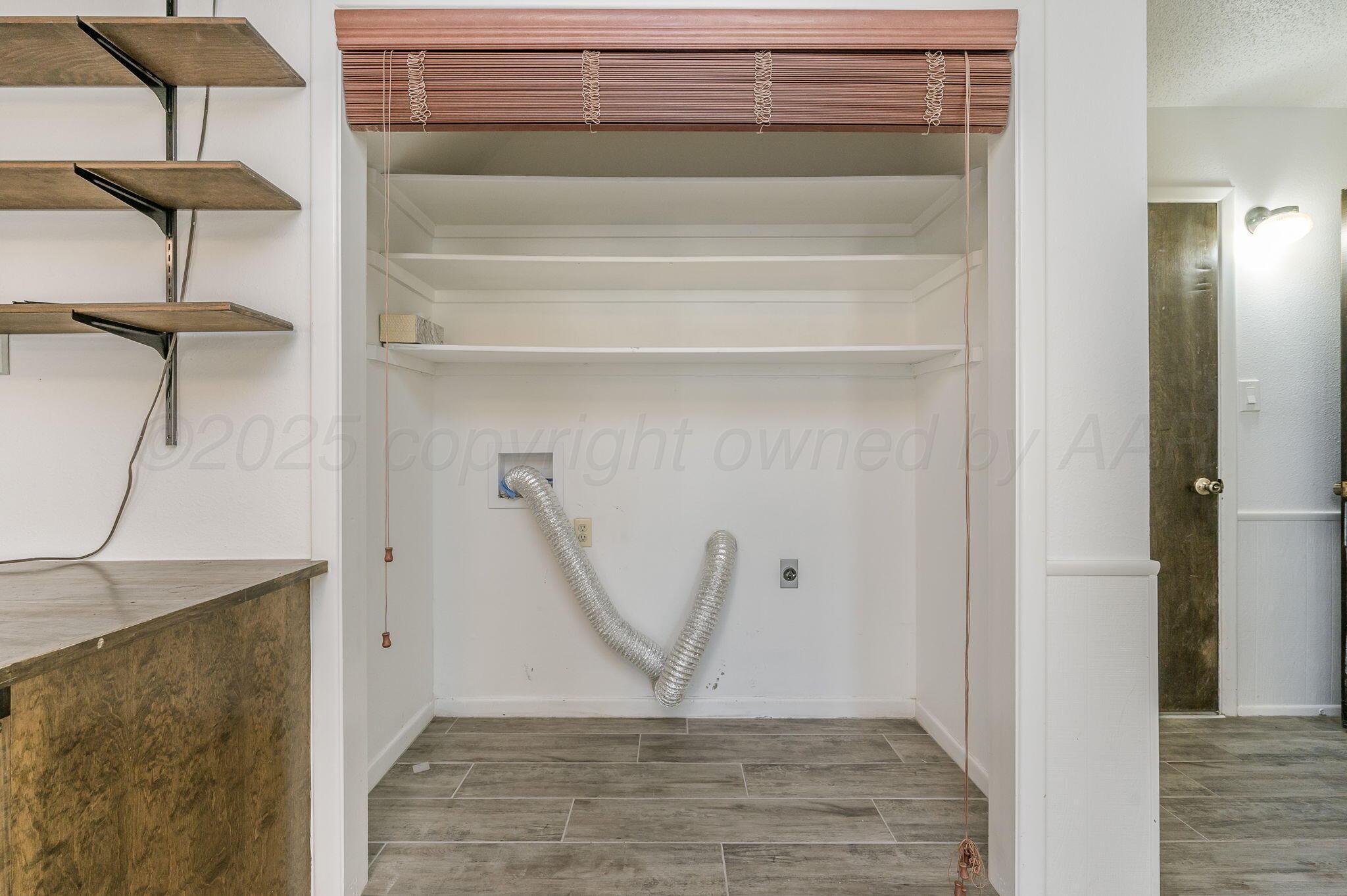 1102 Creekmere Drive Canyon, TX 79015 - Photo 14 of 29 a view of a livingroom with table and a chair