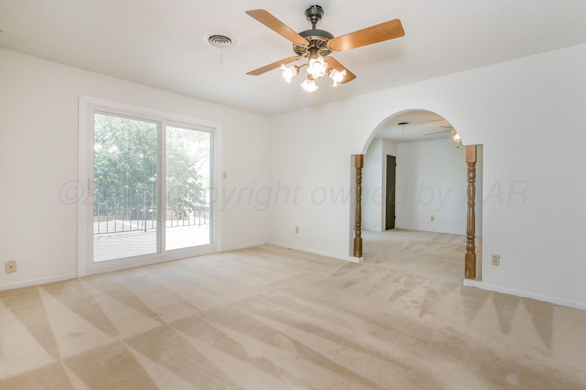 1102 Creekmere Drive Canyon, TX 79015 - Photo 18 of 29 a view of an empty room with a window
