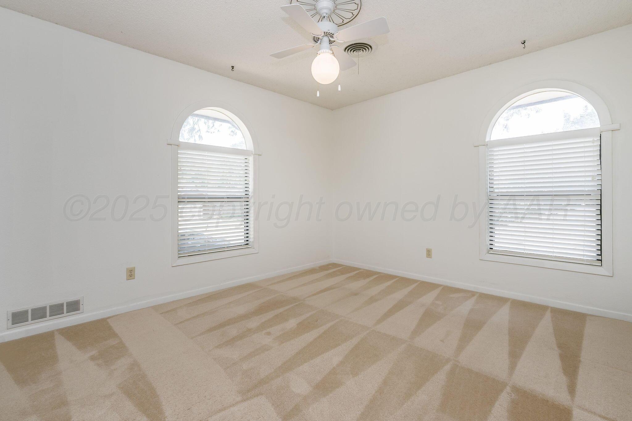 1102 Creekmere Drive Canyon, TX 79015 - Photo 21 of 29 a view of a livingroom with a window