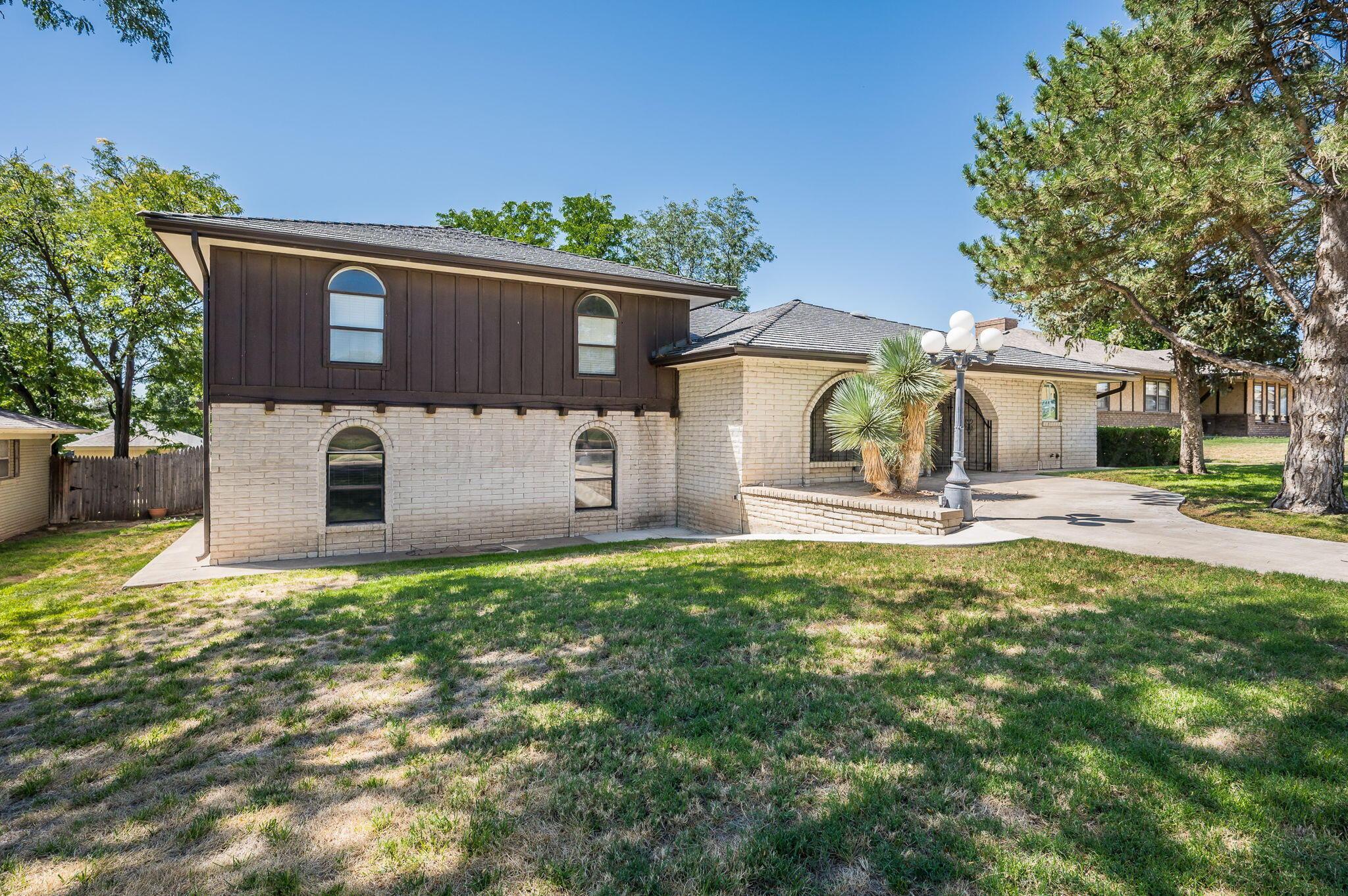 1102 Creekmere Drive Canyon, TX 79015 - Photo 28 of 29 front view of a house with a yard