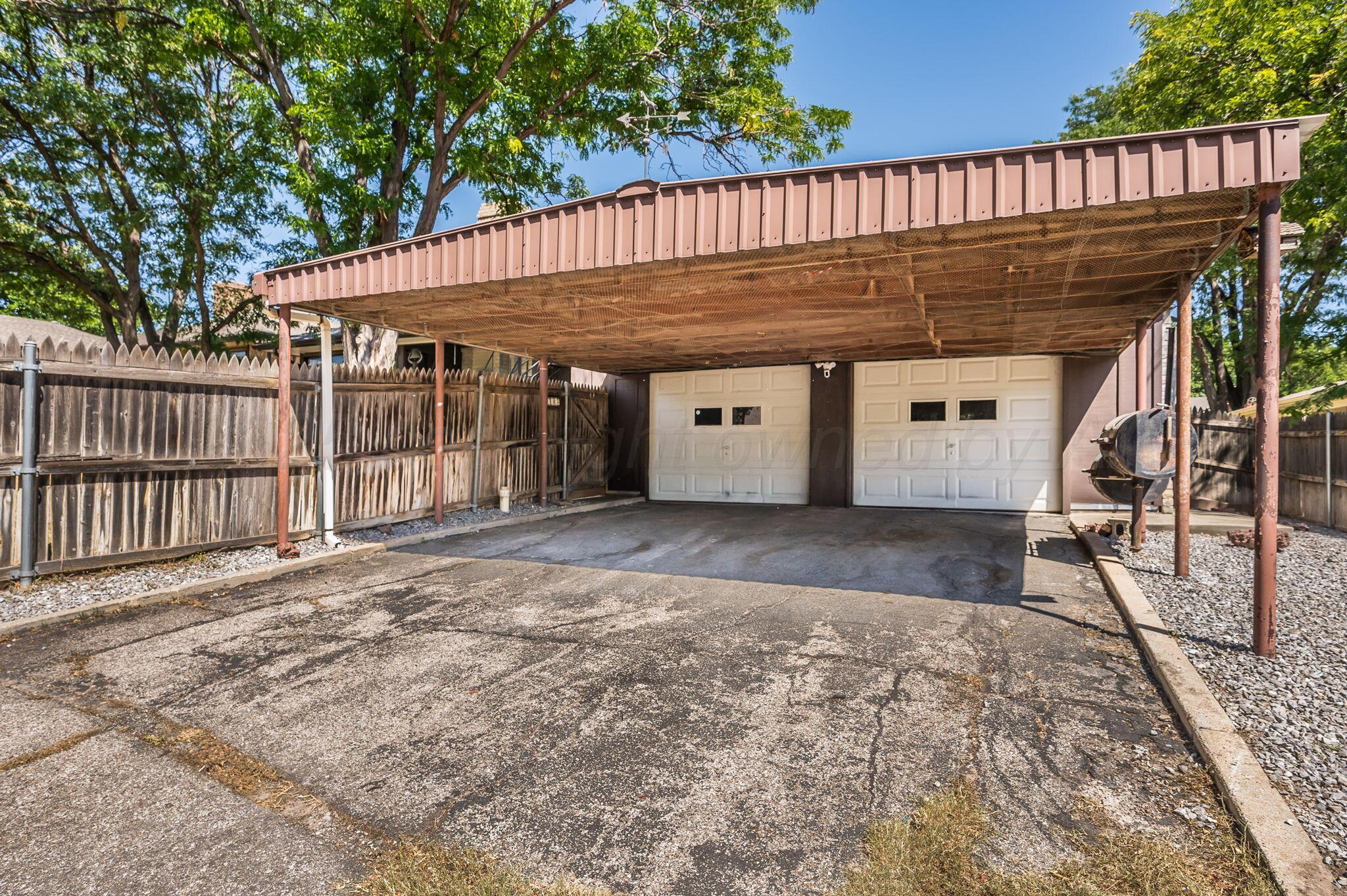 1102 Creekmere Drive Canyon, TX 79015 - Photo 29 of 29 a view of backyard with table and chairs
