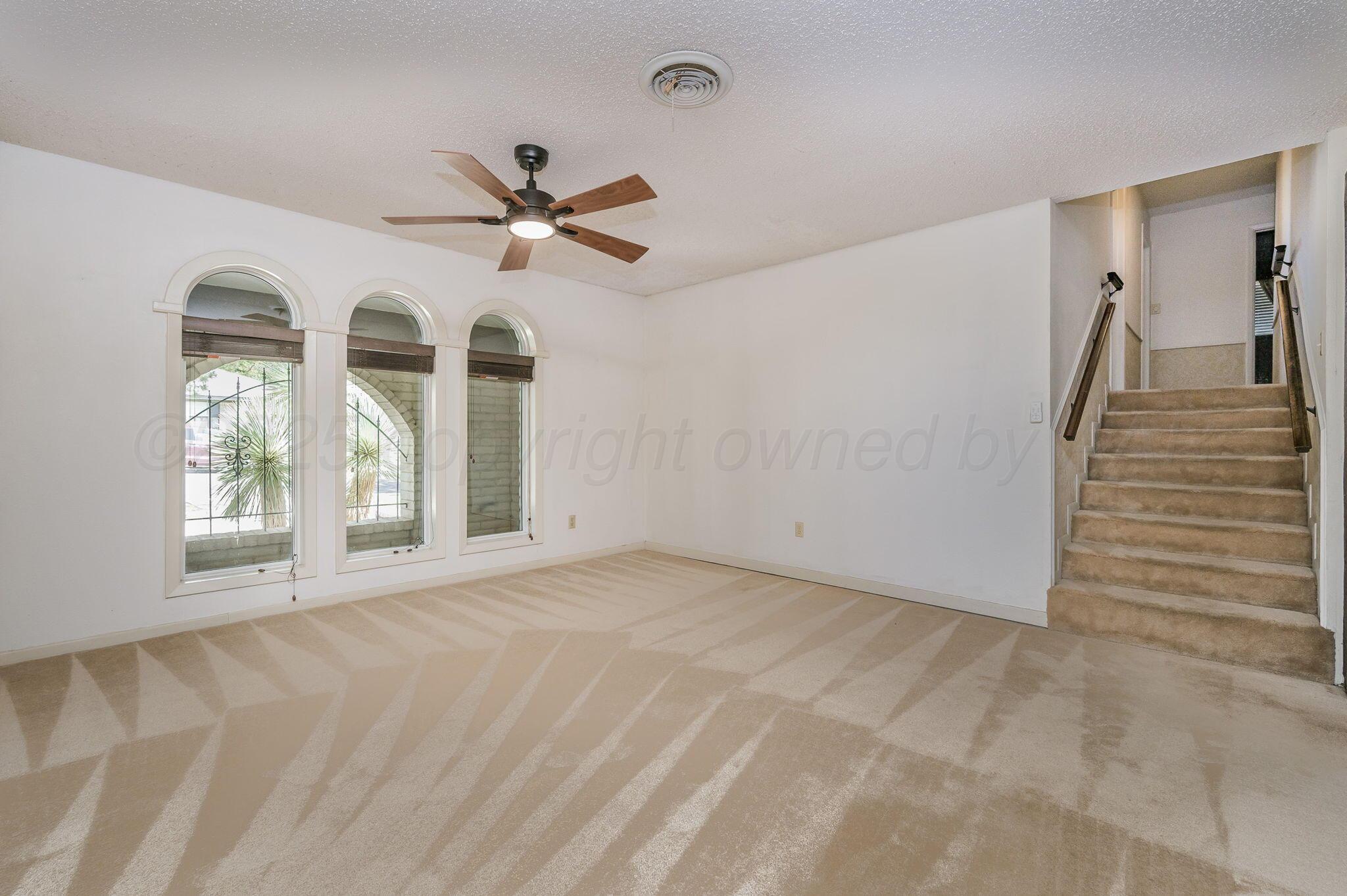 1102 Creekmere Drive Canyon, TX 79015 - Photo 10 of 29 a view of an empty room with a window