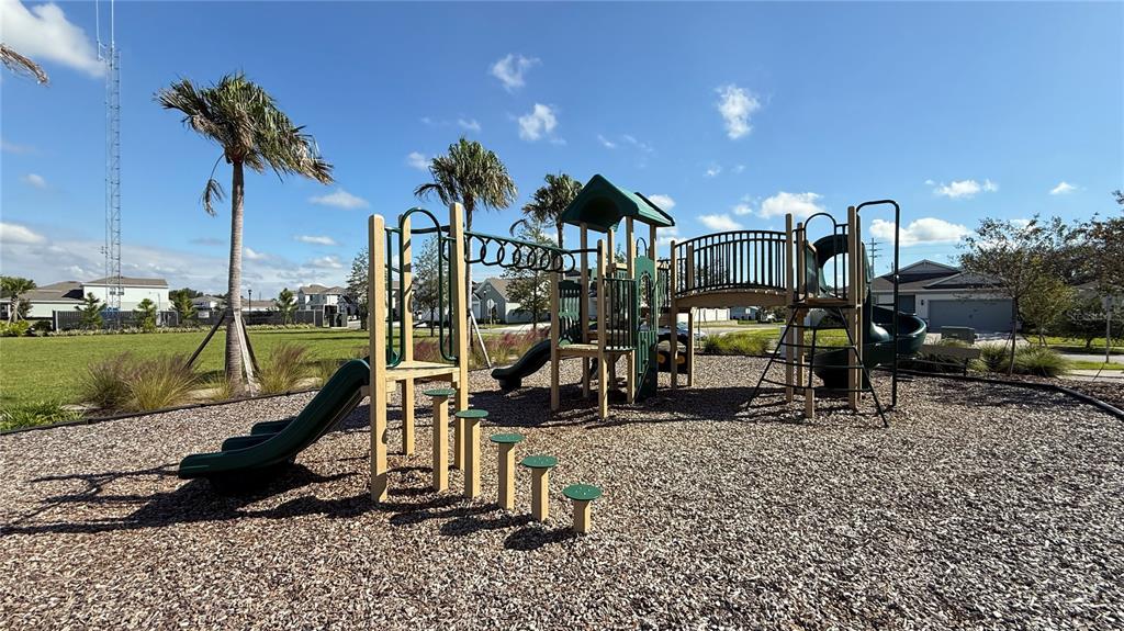 1530 Groveline Road St. Cloud, FL 34771 - Photo 18 of 18 a view of a house with a park