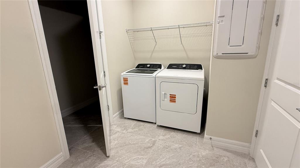 1530 Groveline Road St. Cloud, FL 34771 - Photo 10 of 18 a utility room with dryer and washer