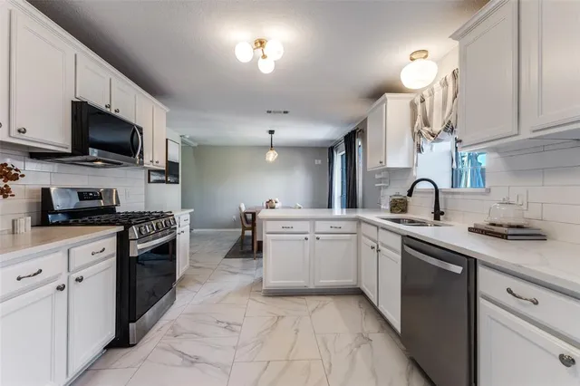 $415,000 | 8209 Weatherly Drive, Rowlett, TX 75089