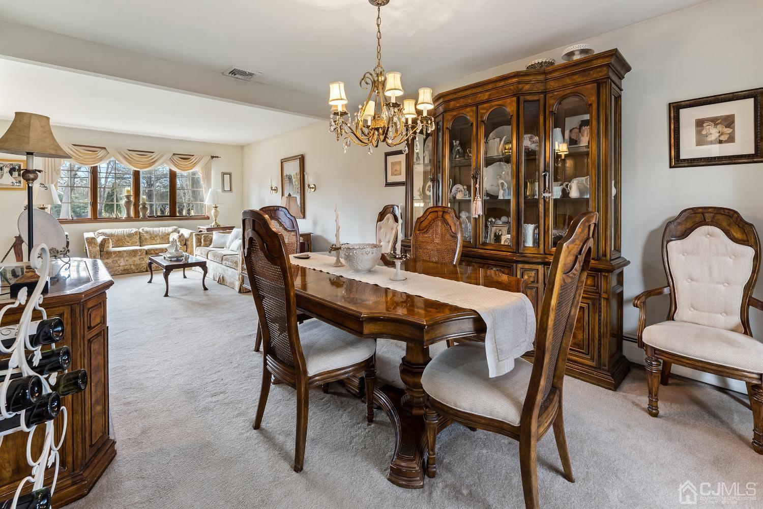 121 Harding Avenue Edison, NJ 08820 - Photo 8 of 30 a dining room with furniture and window