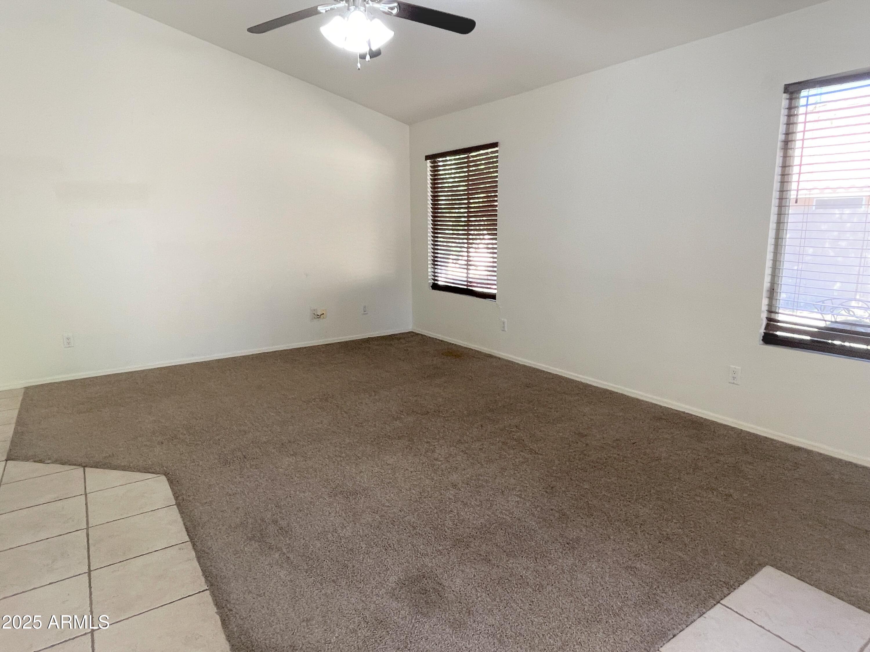 1310 North Longmore Street Chandler, AZ 85224 - Photo 15 of 32 an empty room with windows