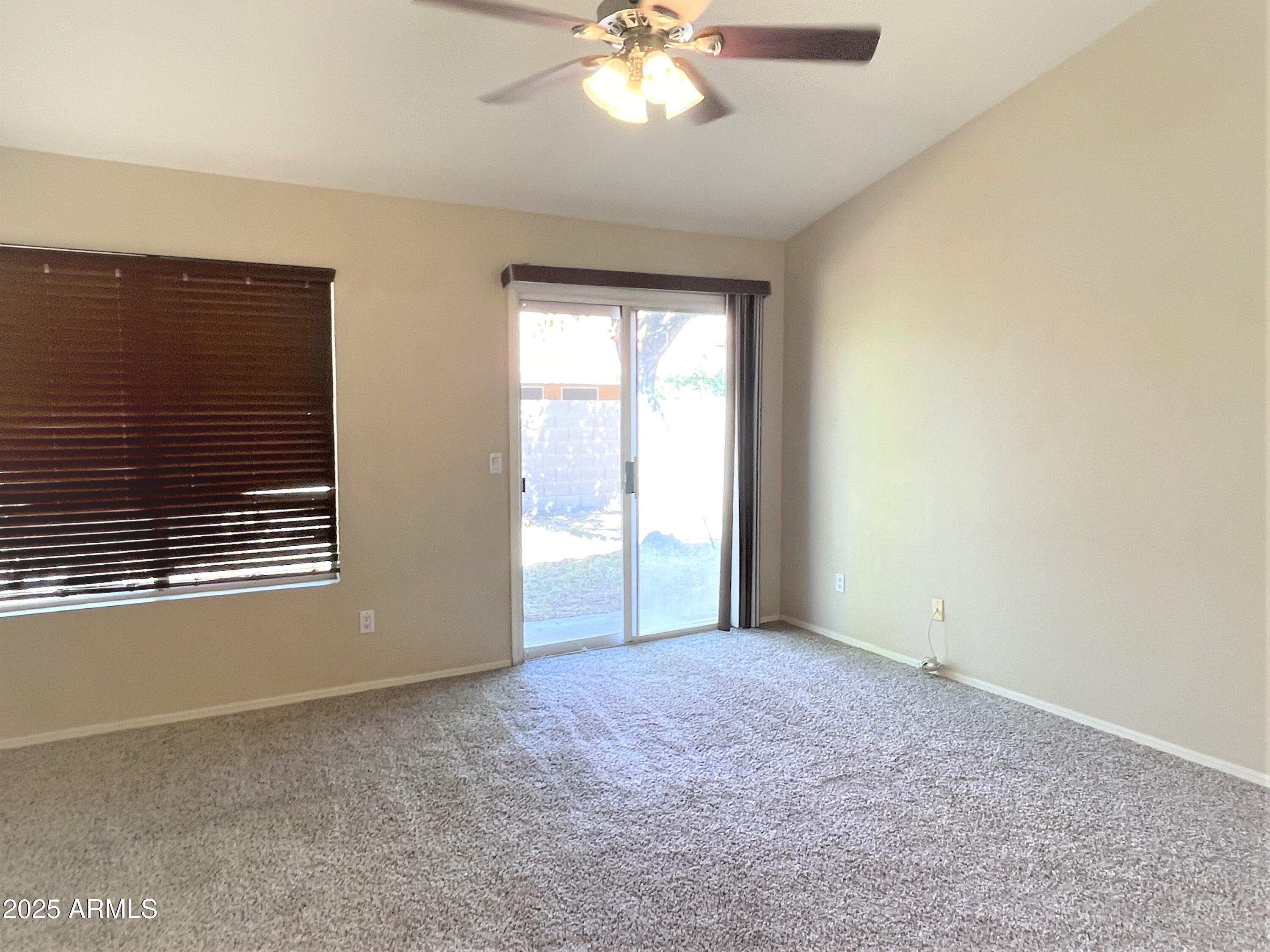1310 North Longmore Street Chandler, AZ 85224 - Photo 16 of 32 a view of an empty room with a window