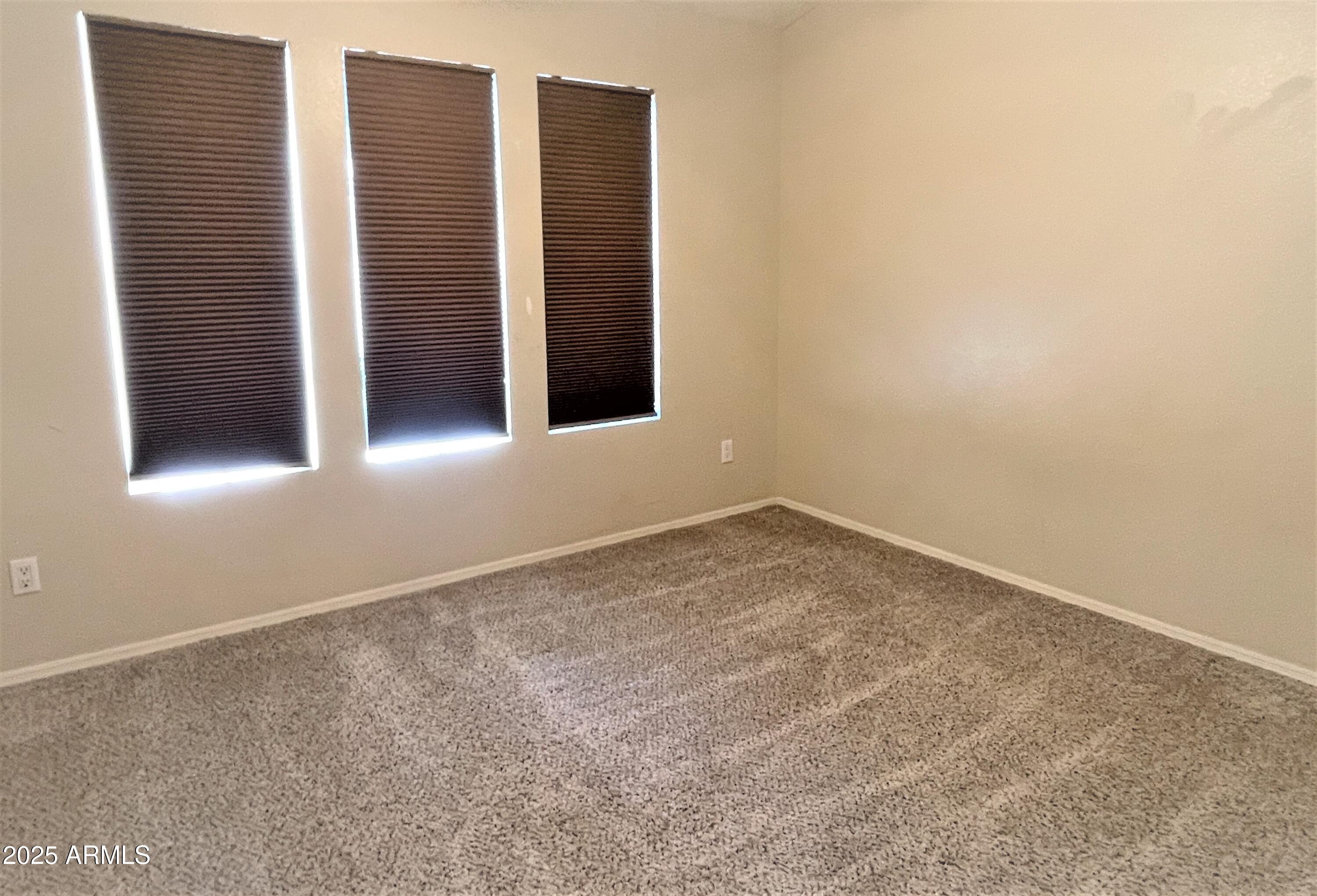 1310 North Longmore Street Chandler, AZ 85224 - Photo 23 of 32 an empty room with windows