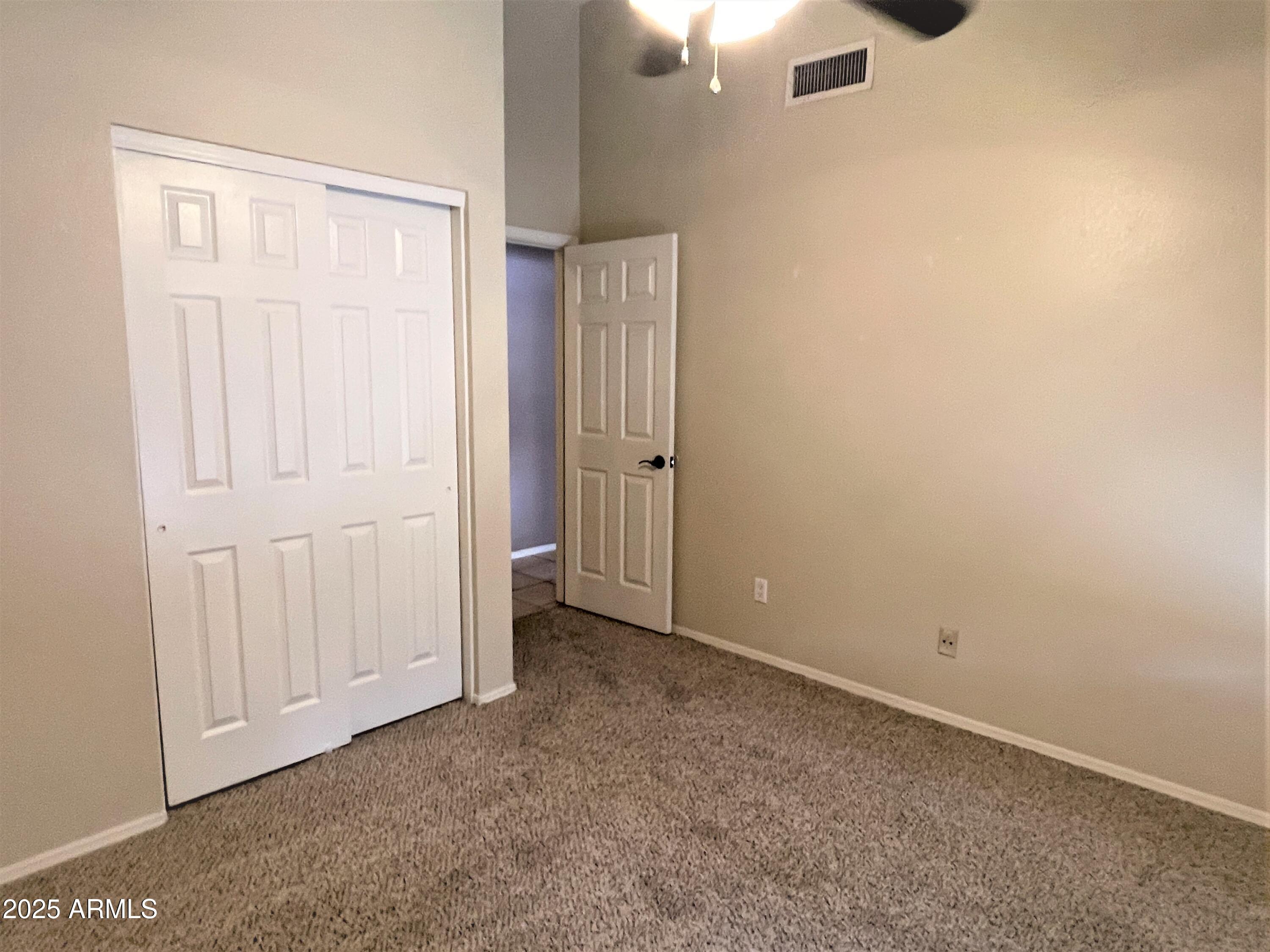 1310 North Longmore Street Chandler, AZ 85224 - Photo 24 of 32 an empty room with windows