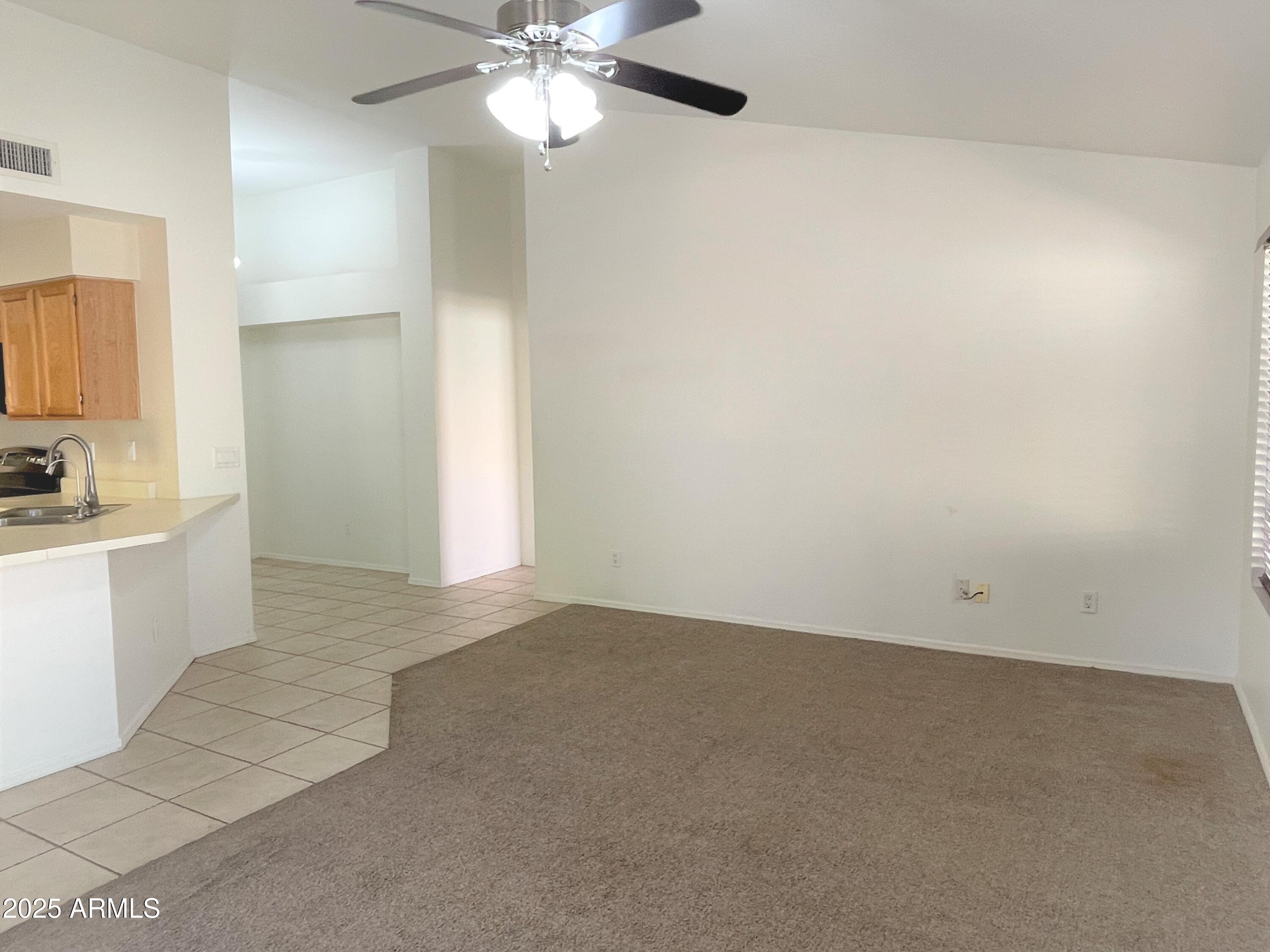 1310 North Longmore Street Chandler, AZ 85224 - Photo 8 of 32 an empty room with a bathroom