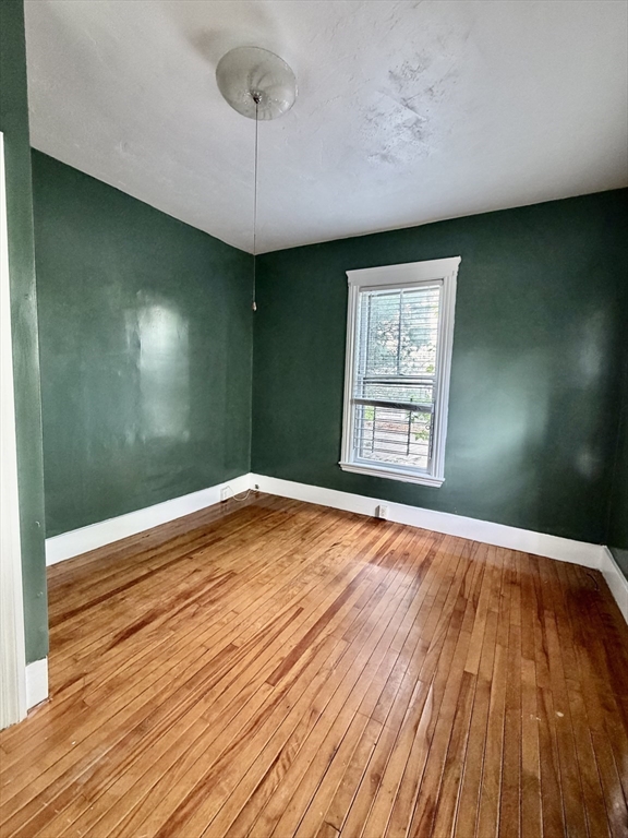 1 Congress Street, Unit 1 Worcester, MA 01609 - Photo 4 of 10 a view of empty room with wooden floor