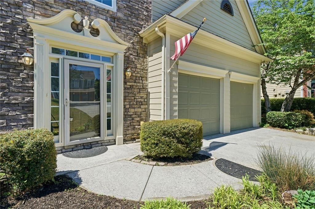 3318 Ridgemill Circle Dacula, GA 30019 - Photo 2 of 106 a front view of a house with a yard