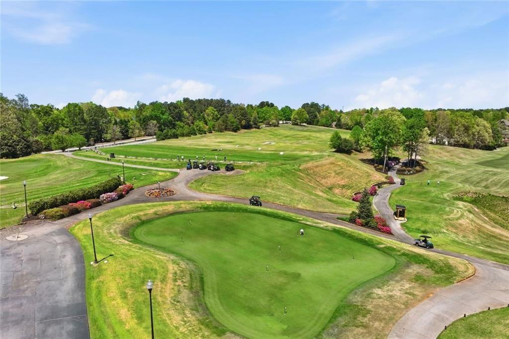 3318 Ridgemill Circle Dacula, GA 30019 - Photo 23 of 106 a view of a golf course with a park