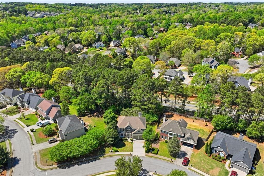 3318 Ridgemill Circle Dacula, GA 30019 - Photo 33 of 106 an aerial view of a house with a yard
