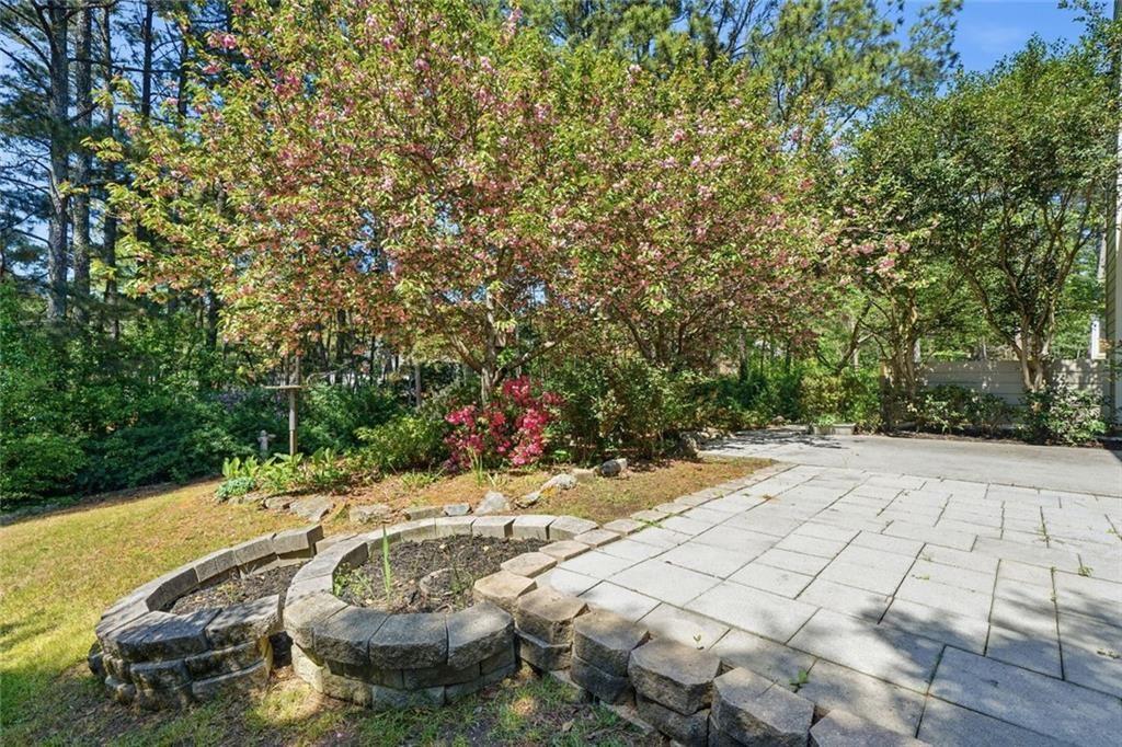 3318 Ridgemill Circle Dacula, GA 30019 - Photo 40 of 106 a view of a backyard with swimming pool