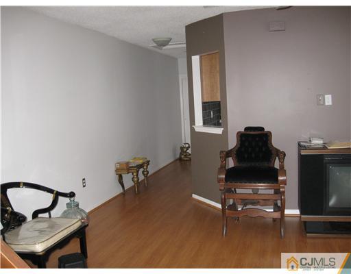 36 Farnham Square Sayreville, NJ 08859 - Photo 15 of 16 a living room with furniture