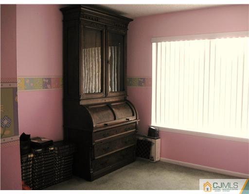 36 Farnham Square Sayreville, NJ 08859 - Photo 9 of 16 a room with furniture and window