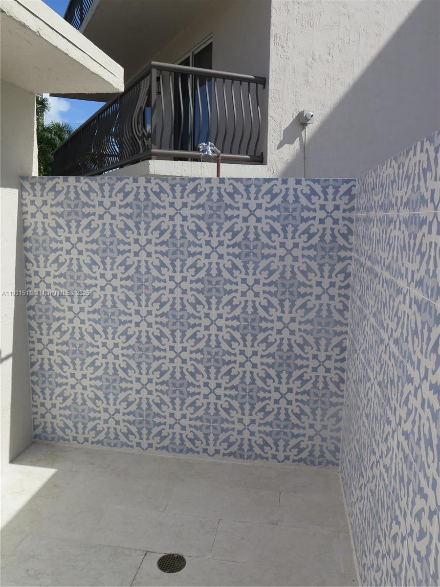 1918 Brickell Avenue, Unit 101 Miami, FL 33129 - Photo 21 of 21 a bathroom with a shower