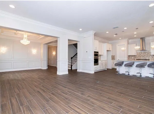 a bathroom with a sink toilet and a mirror