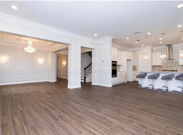 a bathroom with a sink toilet and a mirror