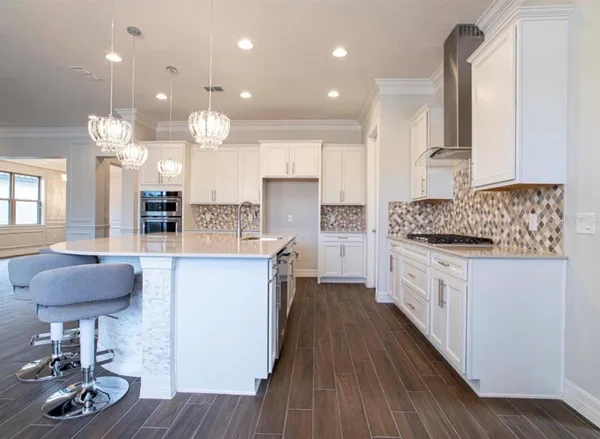 a bathroom with a sink a toilet and a bathtub