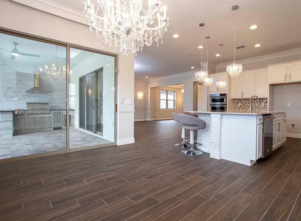 a bathroom with a sink toilet and mirror