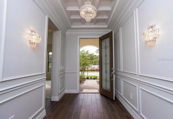 a view of a kitchen with a sink and a stove top oven