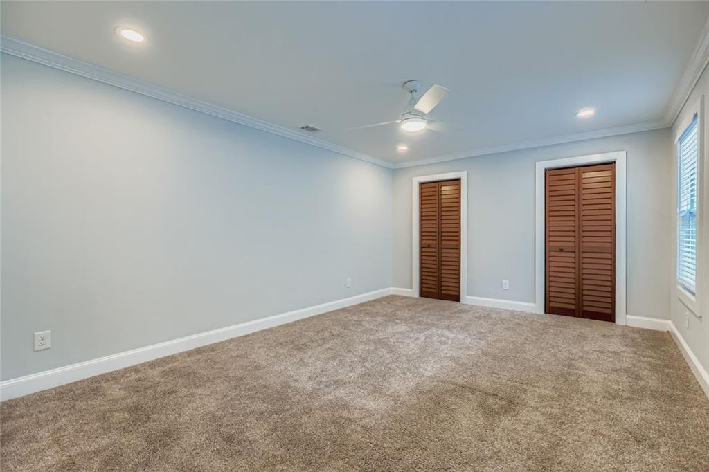 677 Ira Street Southwest Atlanta, GA 30310 - Photo 16 of 28 an empty room with closet area