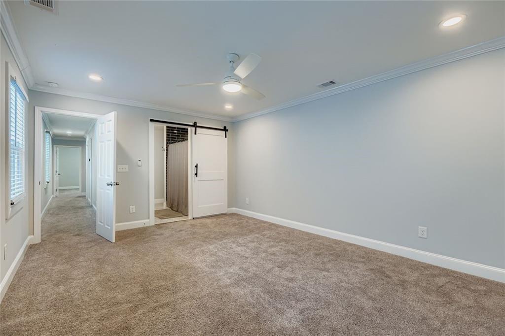677 Ira Street Southwest Atlanta, GA 30310 - Photo 18 of 28 an empty room with an entryway