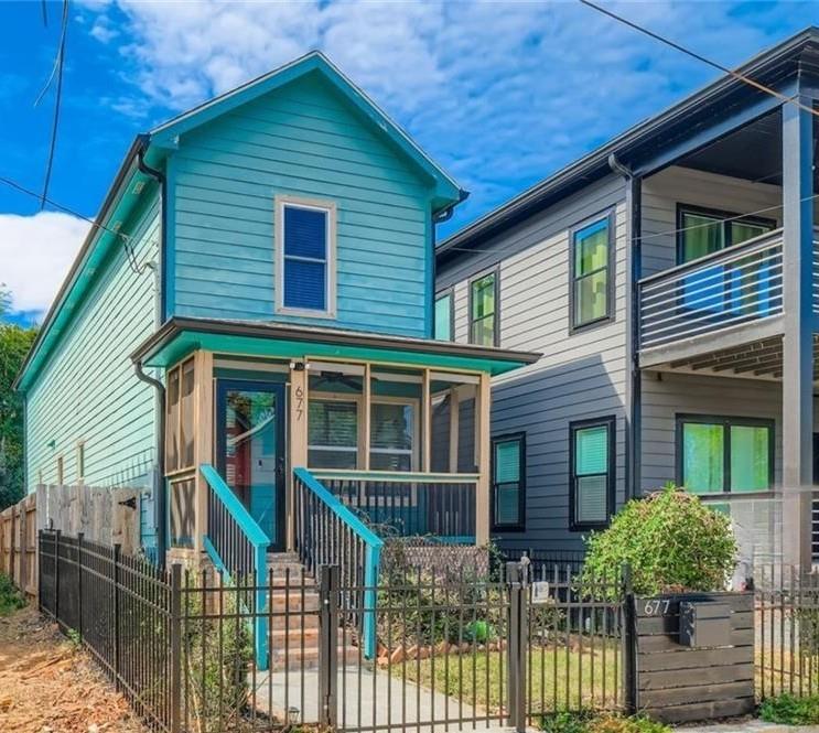 677 Ira Street Southwest Atlanta, GA 30310 - Photo 2 of 28 a front view of a house with a porch