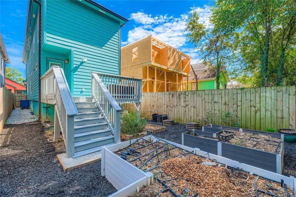 677 Ira Street Southwest Atlanta, GA 30310 - Photo 26 of 28 a view of a chairs and tables in the backyard