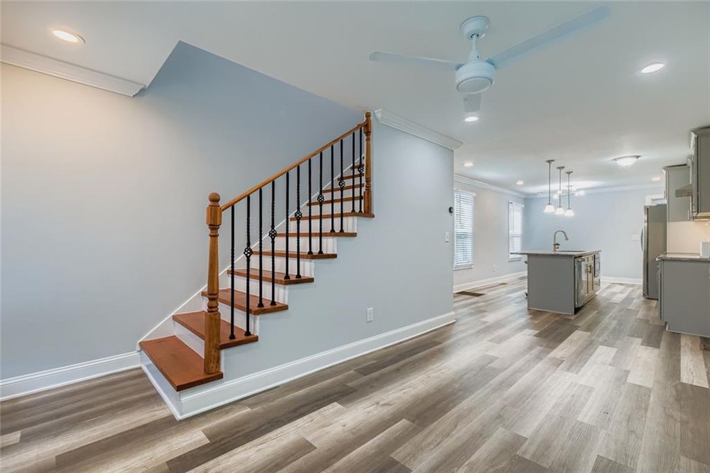 677 Ira Street Southwest Atlanta, GA 30310 - Photo 6 of 28 a view of entryway and hall with wooden floor