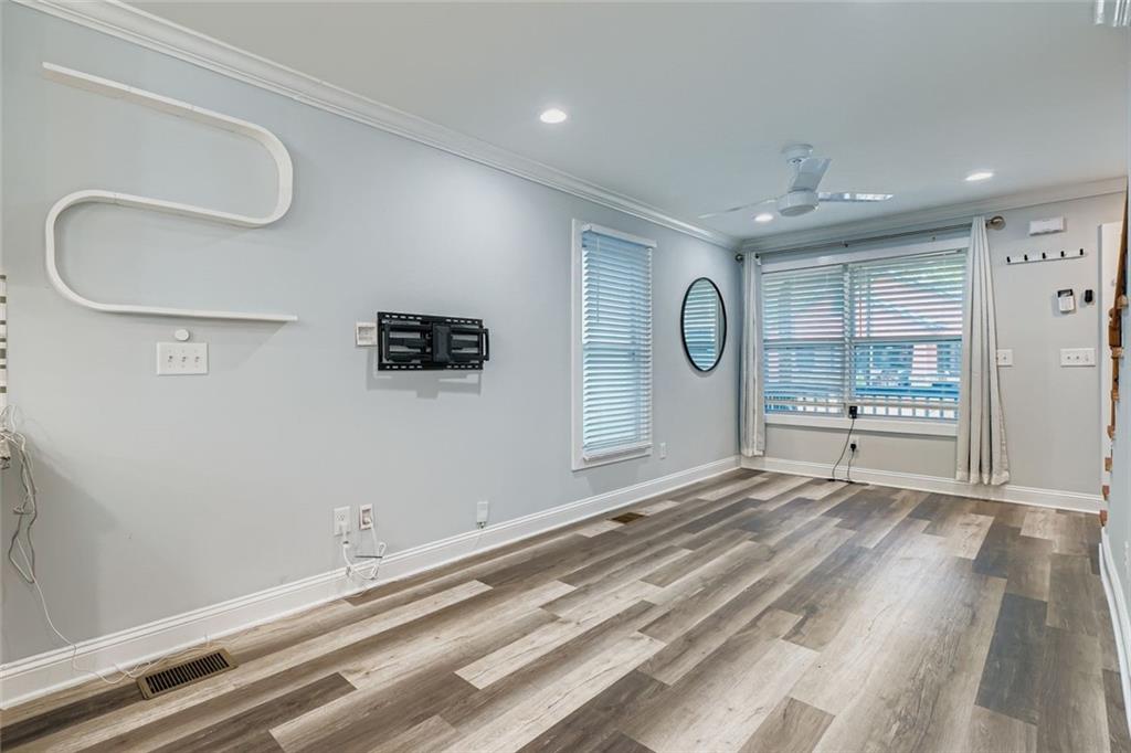 677 Ira Street Southwest Atlanta, GA 30310 - Photo 7 of 28 a view of a livingroom with a dishwasher and cabinets