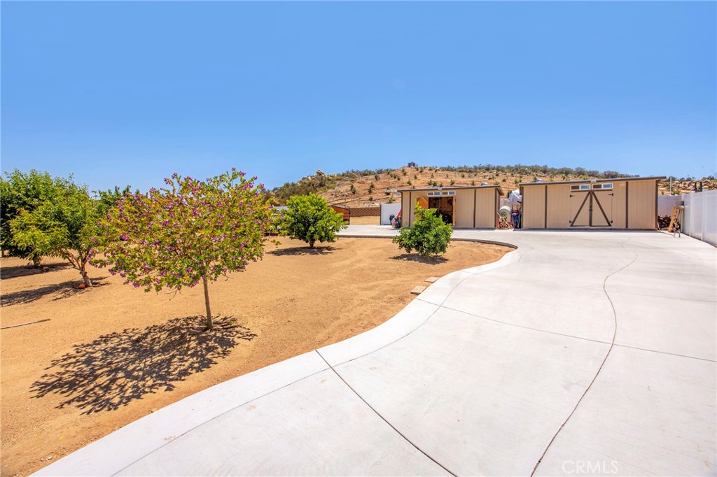 32797 Hayden Road Menifee, CA 92584 - Photo 40 of 51 a view of a terrace with a garden