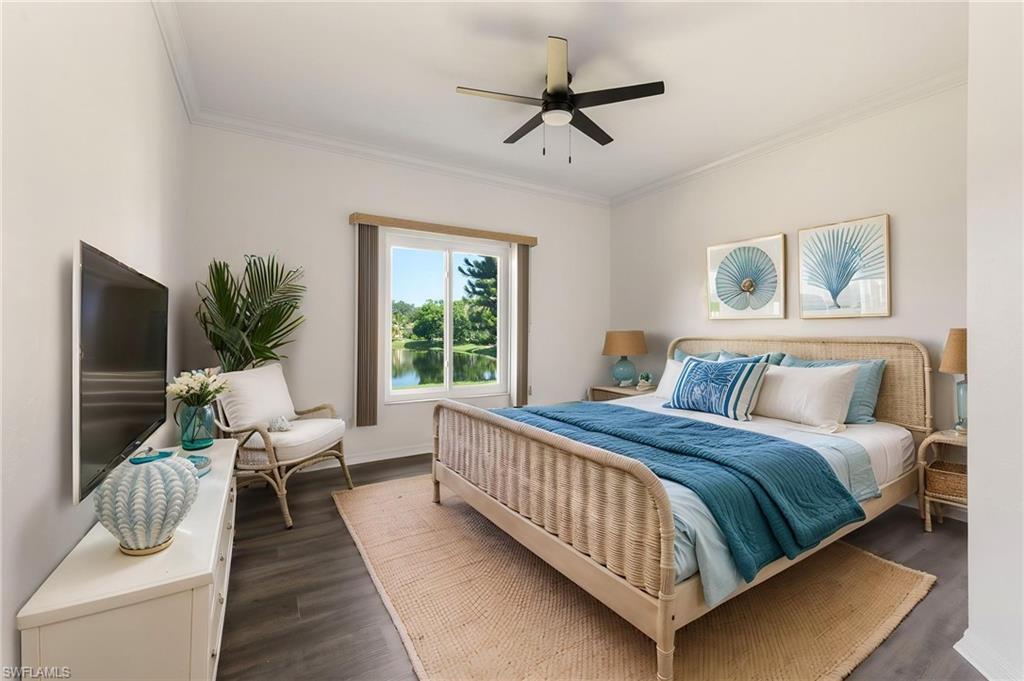 223 Stanhope Circle Naples, FL 34104 - Photo 17 of 41 Spacious room featuring a large window with direct water and foliage scenery