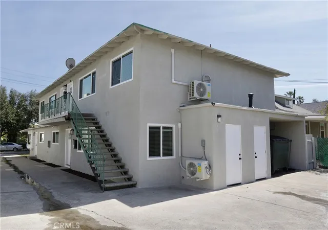 a front view of a house with windows