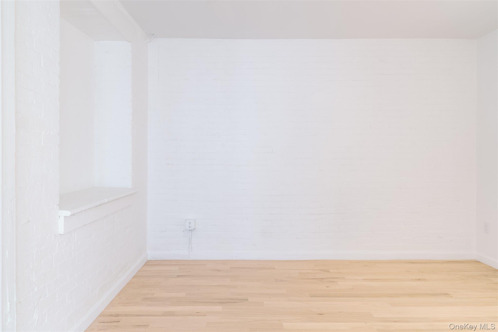 155 River Street, Unit BA Troy, NY 12180 - Photo 6 of 26 Spare room with wood finished floors