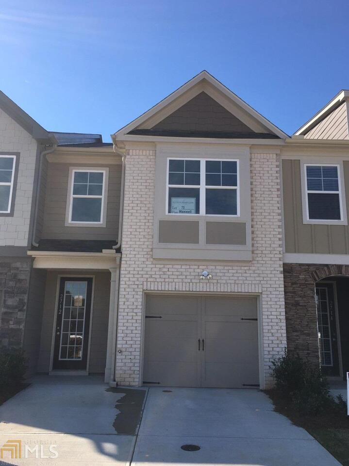 2712 Avanti Way, Unit 75 Decatur, GA 30035 - Photo 1 of 1 a front view of a house with a yard