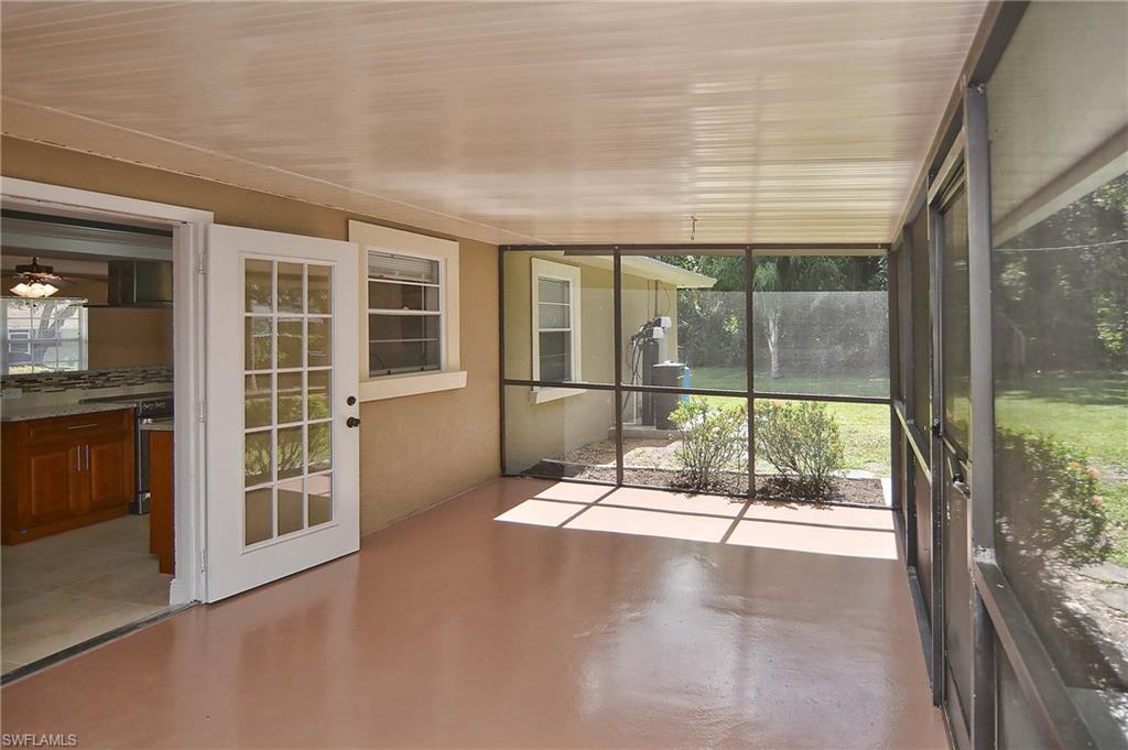 19070 Evergreen Road Fort Myers, FL 33967 - Photo 21 of 25 a view of an empty room with a large window