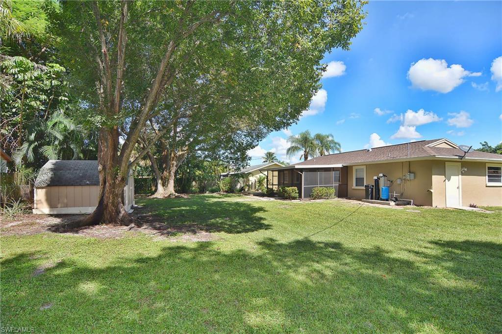 19070 Evergreen Road Fort Myers, FL 33967 - Photo 25 of 25 a front view of house with yard and trees