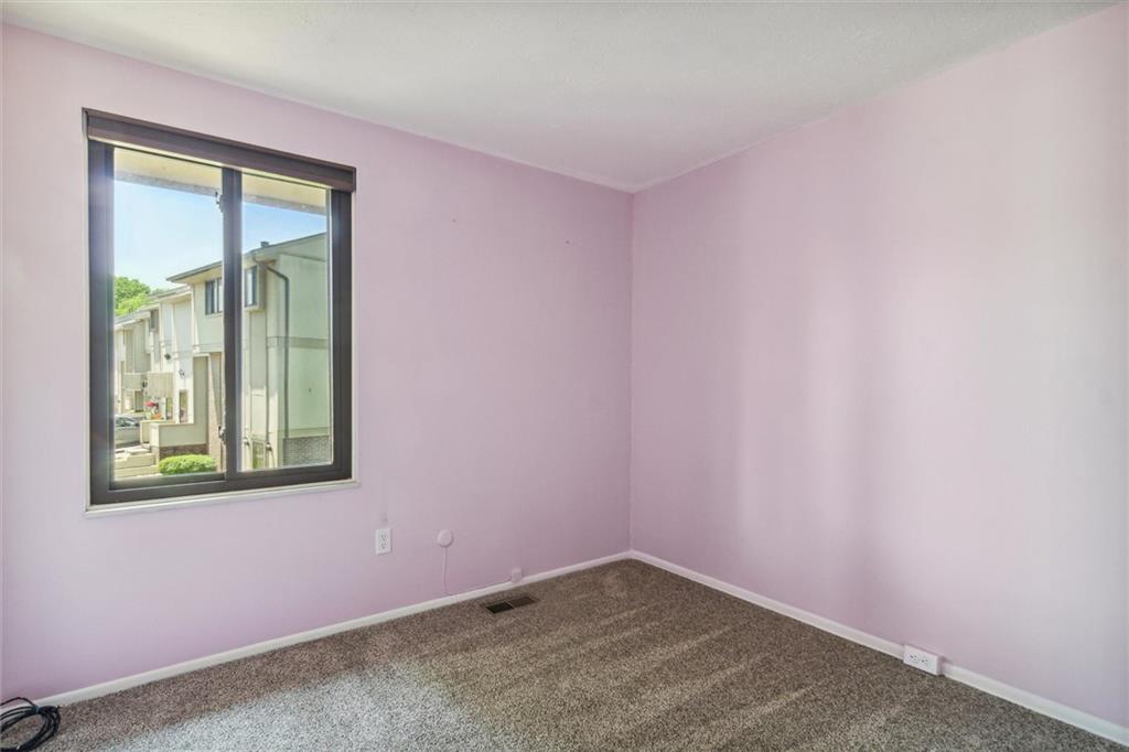 310 Ridge Point Circle Bridgeville, PA 15017 - Photo 13 of 24 an empty room with a window