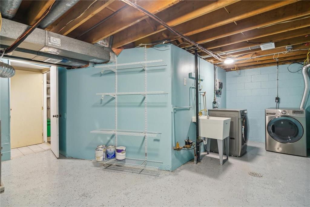 310 Ridge Point Circle Bridgeville, PA 15017 - Photo 21 of 24 a utility room with dryer and washer