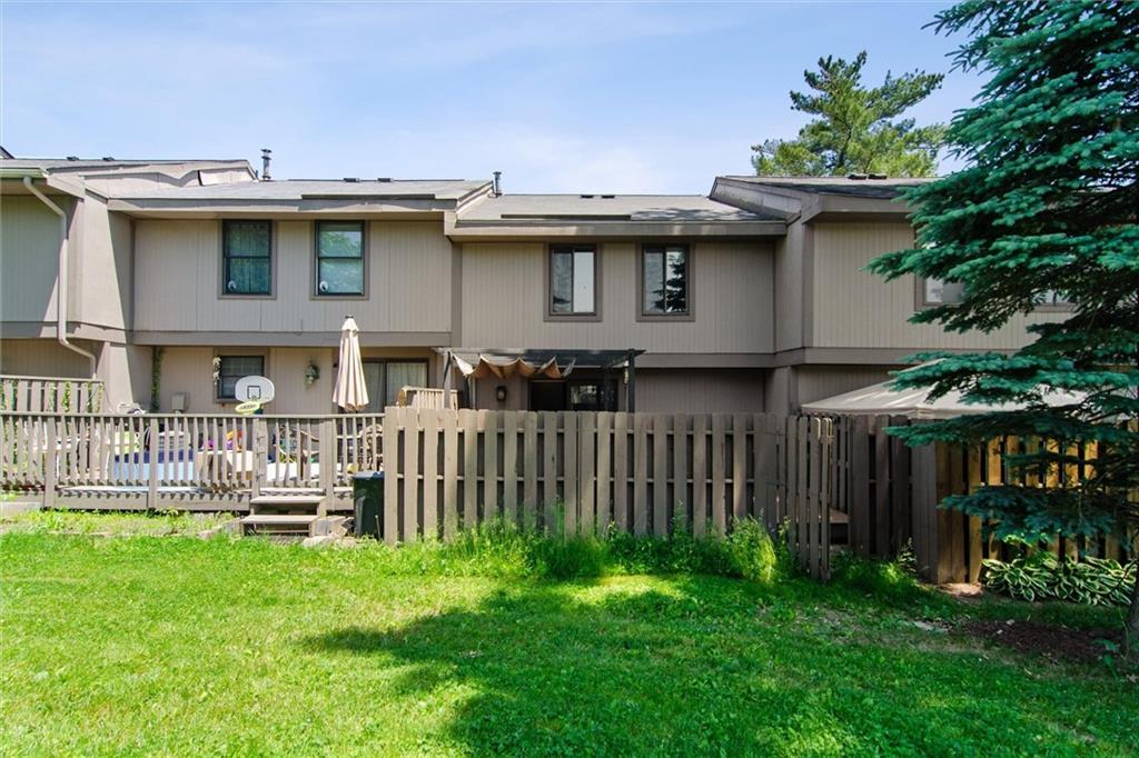310 Ridge Point Circle Bridgeville, PA 15017 - Photo 24 of 24 a view of a house with a yard and plants
